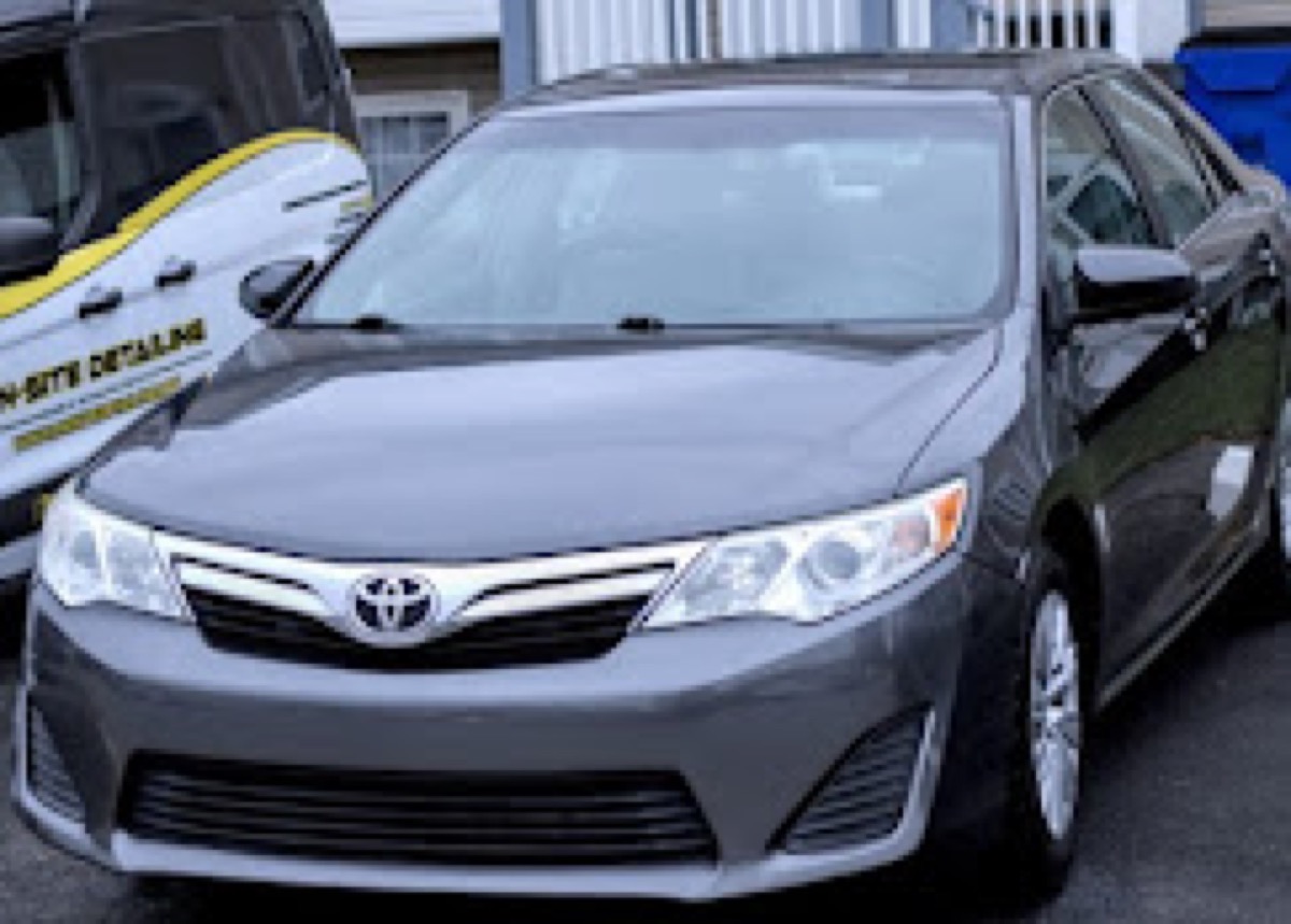 Full paint correction and detail on dark vehicle